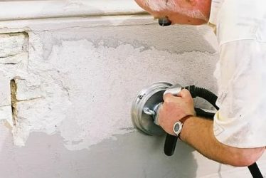 Как снять краску с бетонной стены?