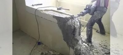 Как правильно сломать бетонную стену в квартире?