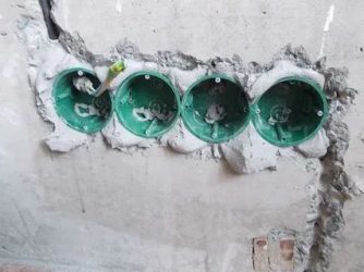 Монтаж подрозетников в бетонной стене