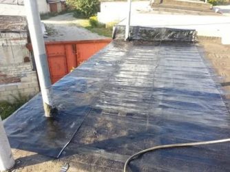 Чем покрыть крышу гаража из бетонных плит?