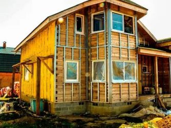 Утепление и отделка фасада частного деревянного дома