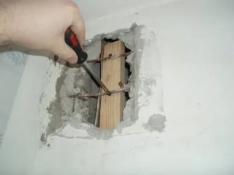 Каким раствором заделать дыры в стене?