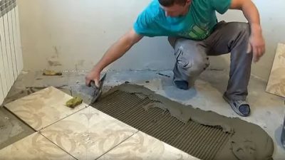 Как положить керамогранитную плитку на бетонный пол?
