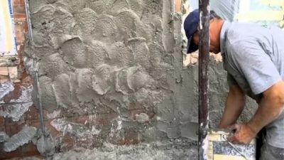 Как штукатурить бетонные стены своими руками?